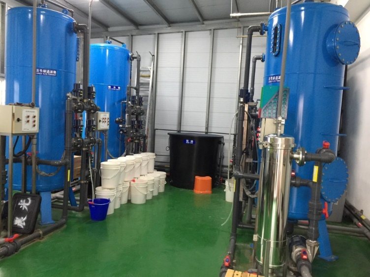 Filtration and softening vessels for a pure water system